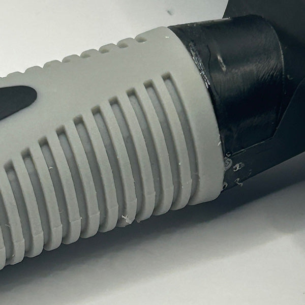 close up of junction between handle and brush head