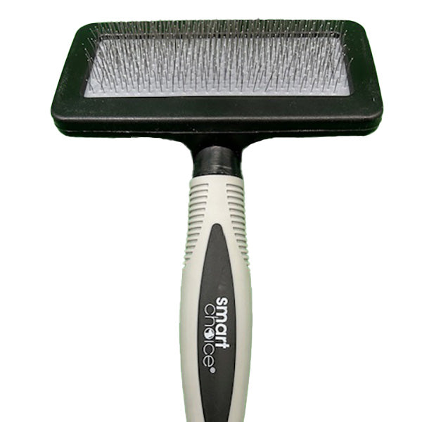Pet grooming brush with head and handle on a white background