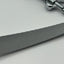 Gray strap with a metal buckle on a white background