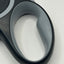 Close-up of a gray and black handle on a light gray background