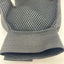Close-up of a black palm side of glove with mesh design on a white background