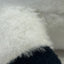 Close-up of white and black fur texture