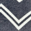 Close-up of a textured surface with a chevron pattern