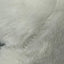 Close-up of white fur texture stitch detail