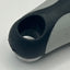 Close-up of brush with a black & grey  handle on a white background