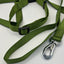 Green dog leash with a metal clip on a white background