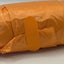 Orange roll of doggie bags with sticker detail